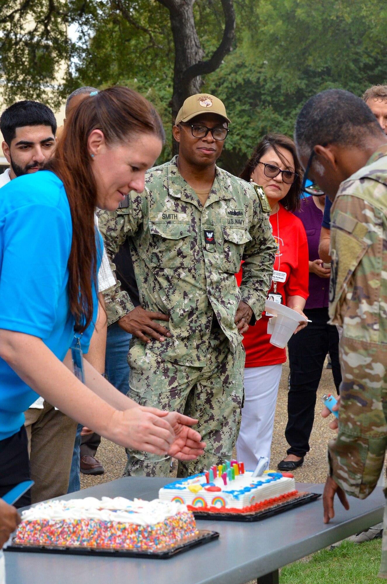 Personnel from the 637th Training Group - Defense Language Institute English Language Center - close out the organization’s 70th Anniversary event with a birthday song and cake cutting at Joint Base San Antonio-Lackland, Texas, July 31, 2024.