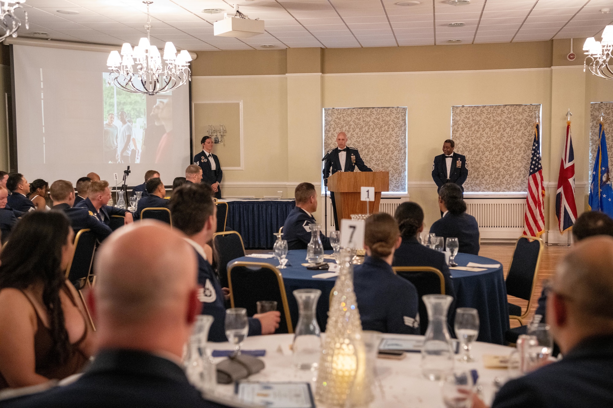 Airman gives remarks during an ALS graduation ceremony