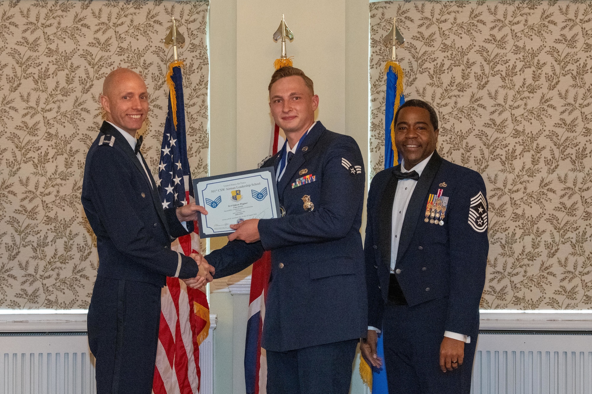 Student receives an Airman Leadership School Diploma