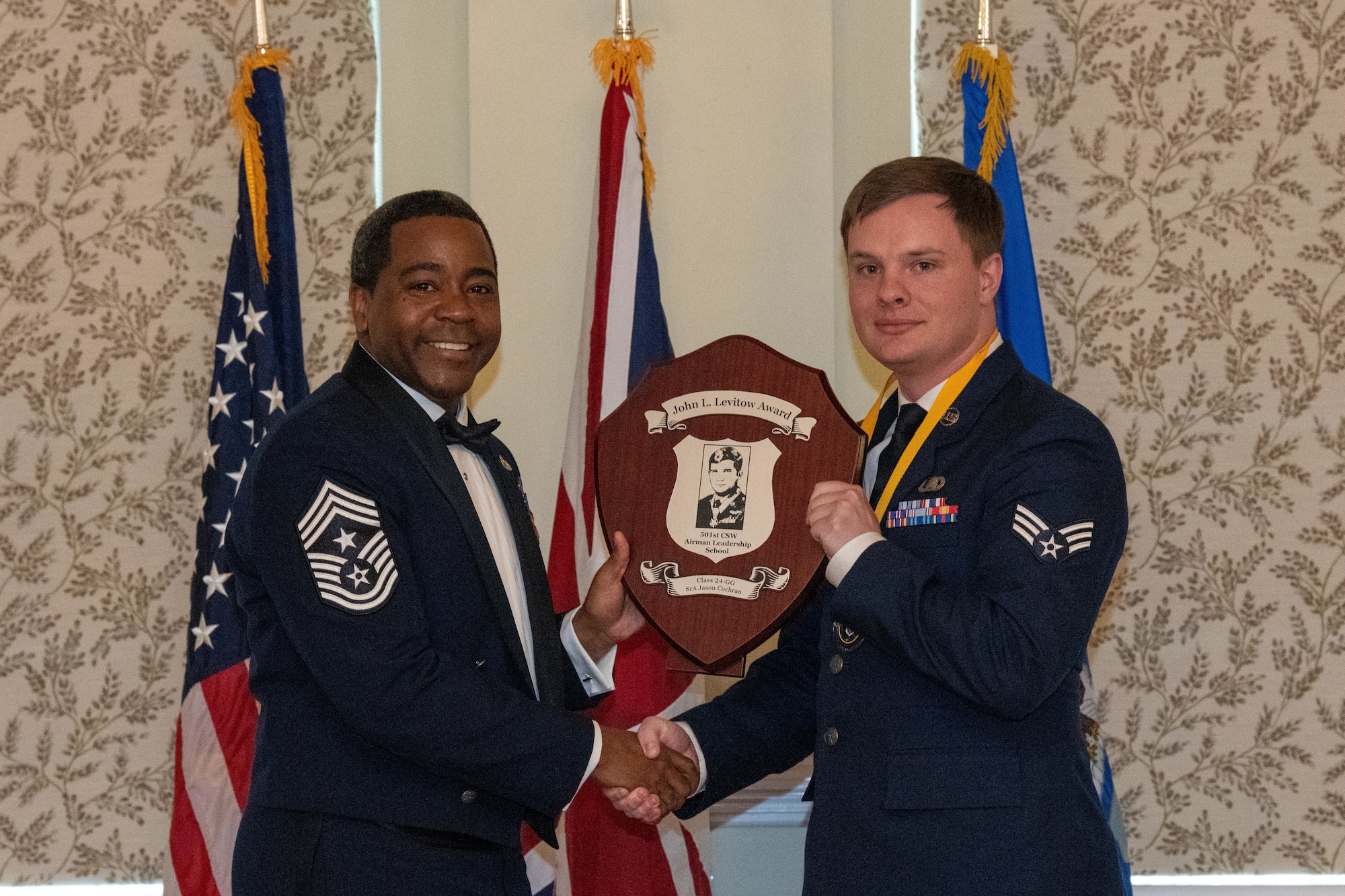Airman receives John L. Levitow award during an Airman Leadership School graduation ceremony