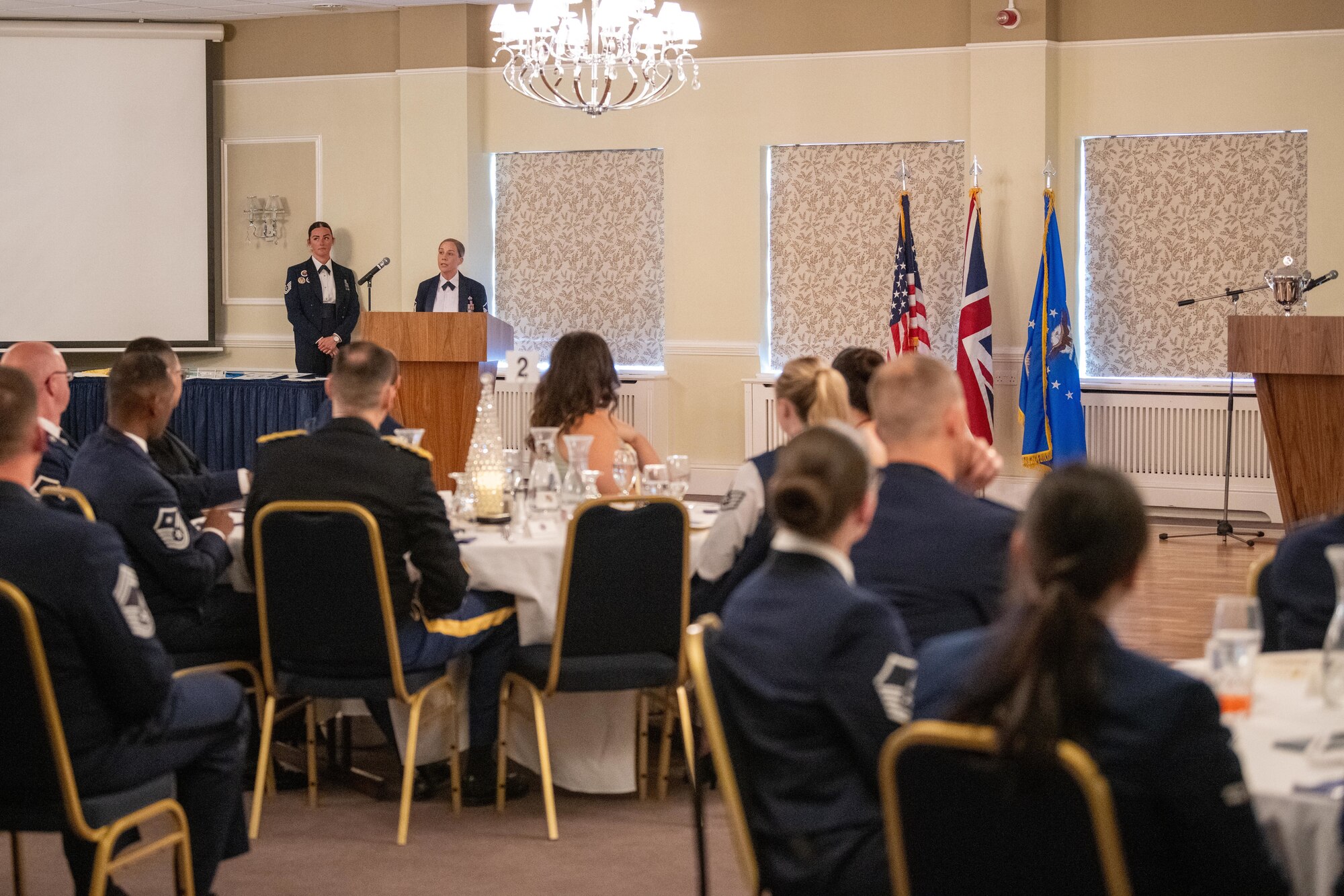 Airman gives remarks during an ALS graduation ceremony