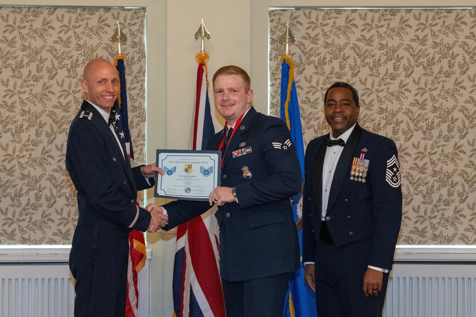 Student receives an Airman Leadership School Diploma