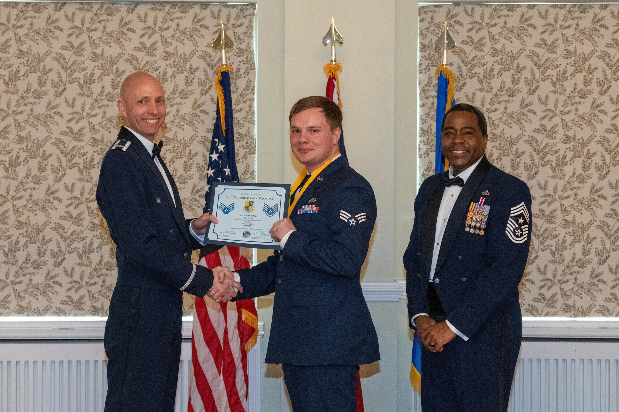 Student receives an Airman Leadership School Diploma