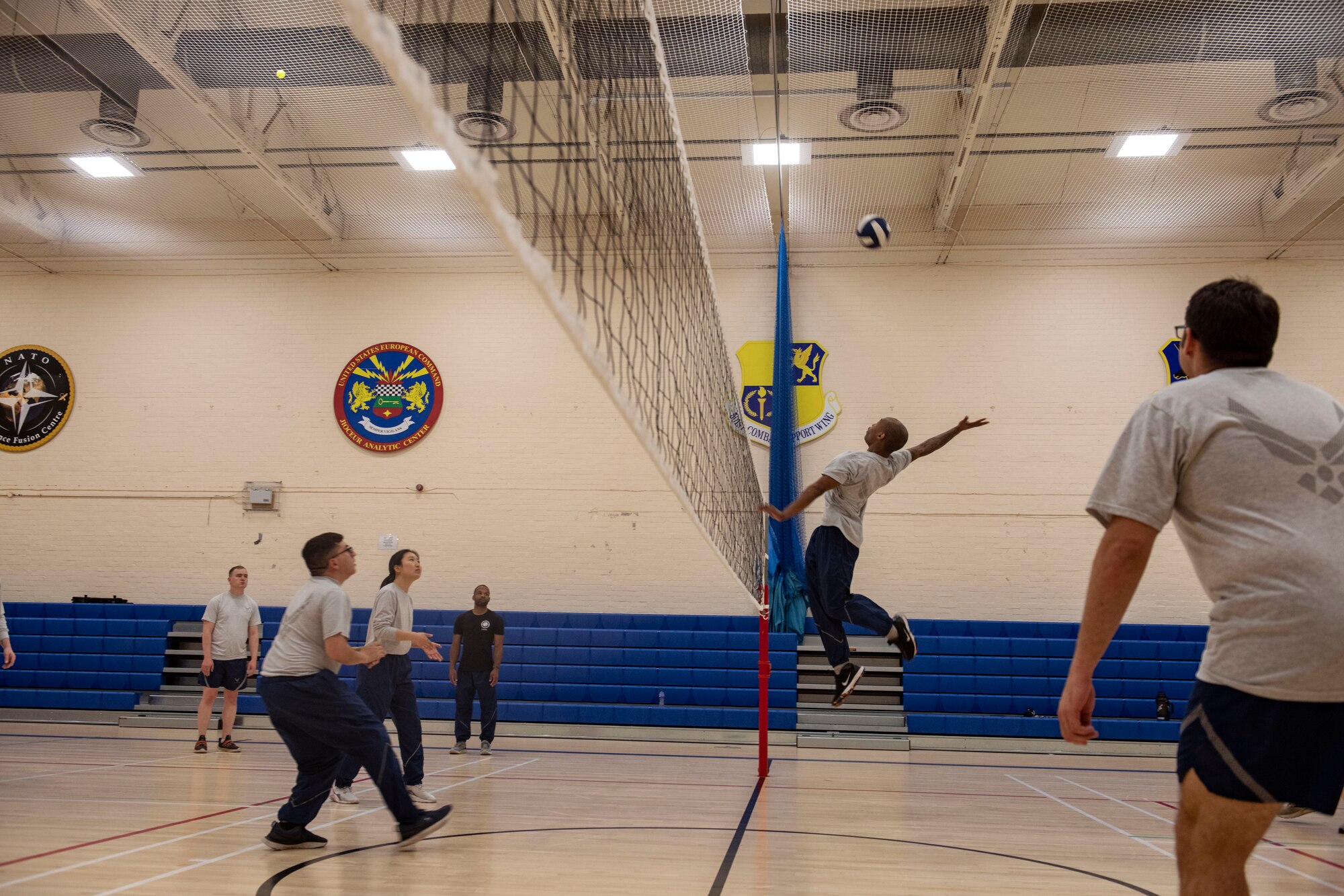 Students play volleyball