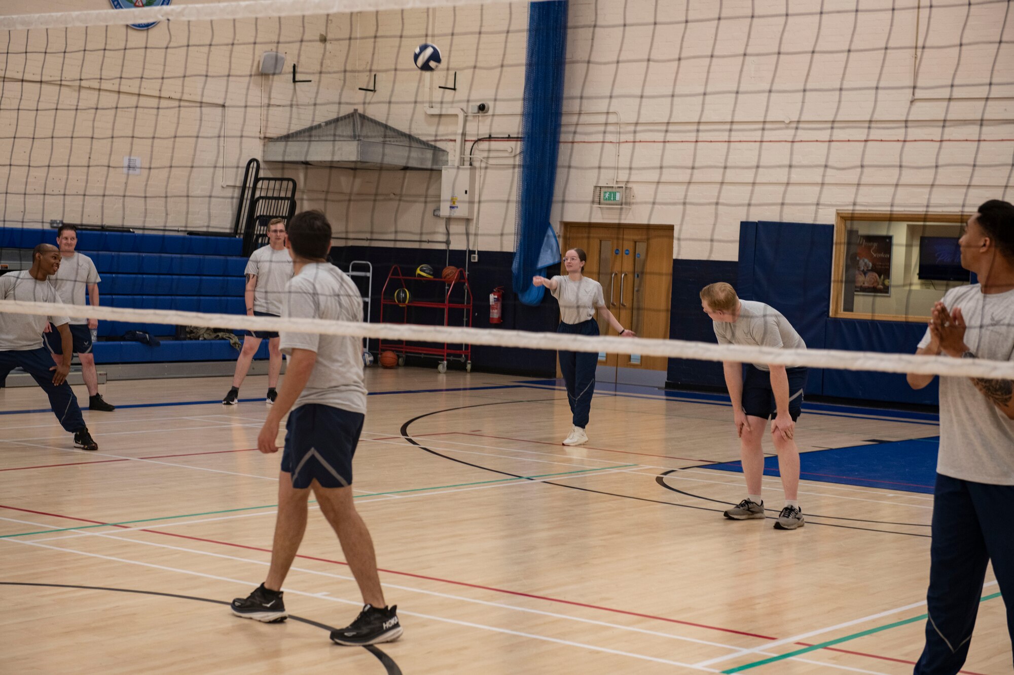 Students play volleyball