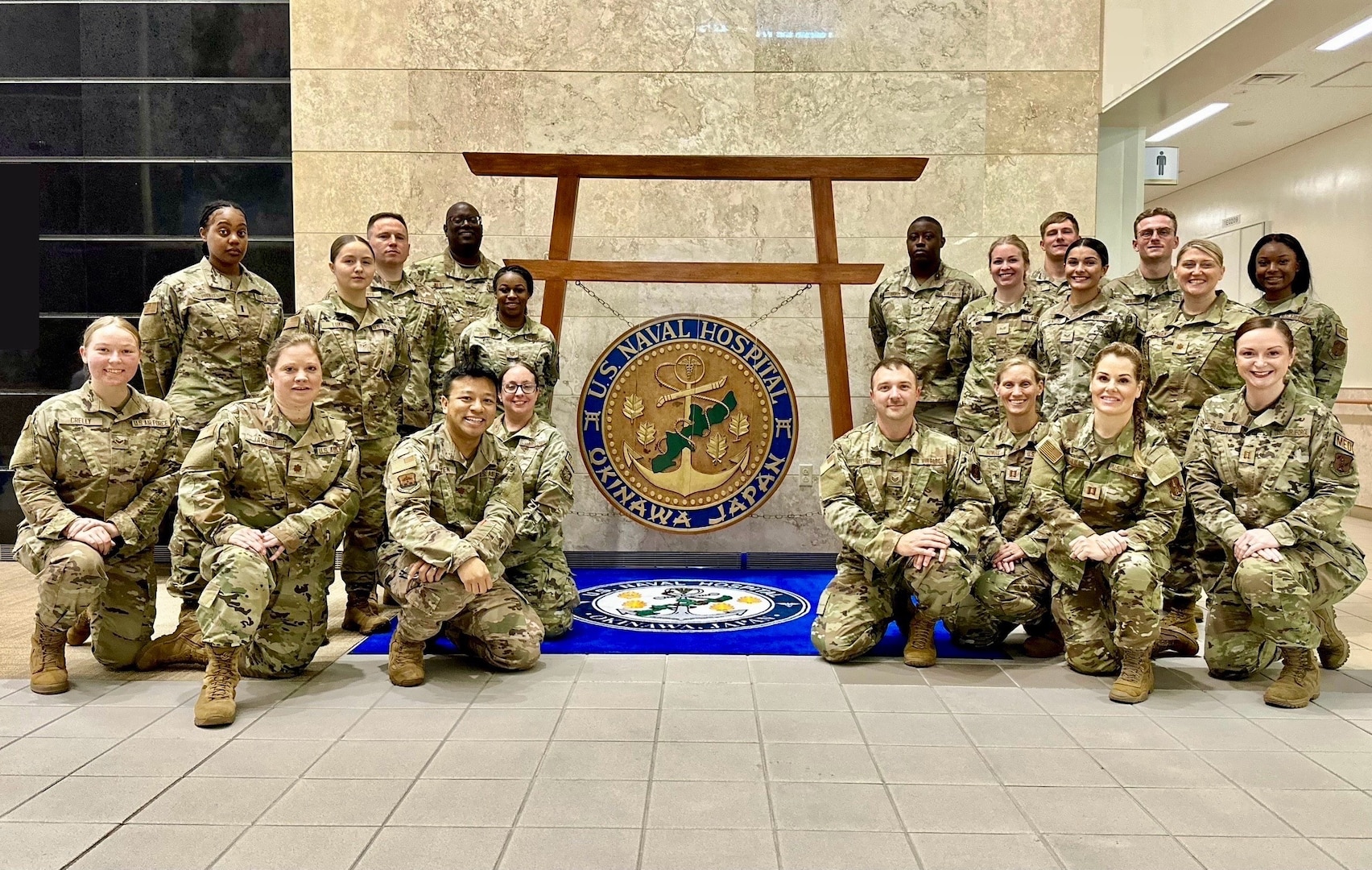 U.S. Airmen assigned to the 165th Medical Group, 165th Airlift Wing, Georgia Air National Guard, pose for a photo at the U.S. Naval Hospital in Okinawa, Japan, June 18, 2024. The 165th MDG trained on basic medical procedures in a joint operations environment June 9-24, 2024.