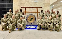 U.S. Airmen assigned to the 165th Medical Group, 165th Airlift Wing, Georgia Air National Guard, pose for a photo at the U.S. Naval Hospital in Okinawa, Japan, June 18, 2024. The 165th MDG trained on basic medical procedures in a joint operations environment June 9-24, 2024.