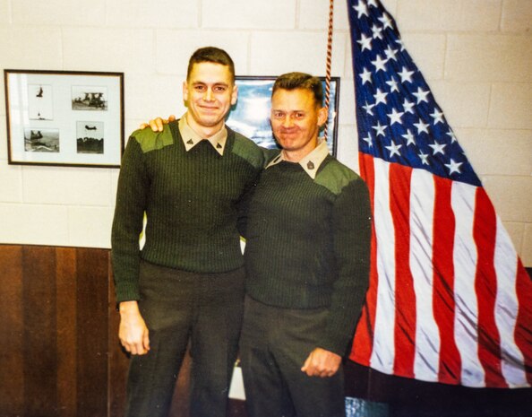 IMAGE: Cpl. Christopher Lloyd captures a photo with Marine Corps Gunnery Sgt. Gary Morris, his first staff non-commissioned officer and mentor as well as a friend, at his retirement ceremony at New River Air Station, North Carolina.