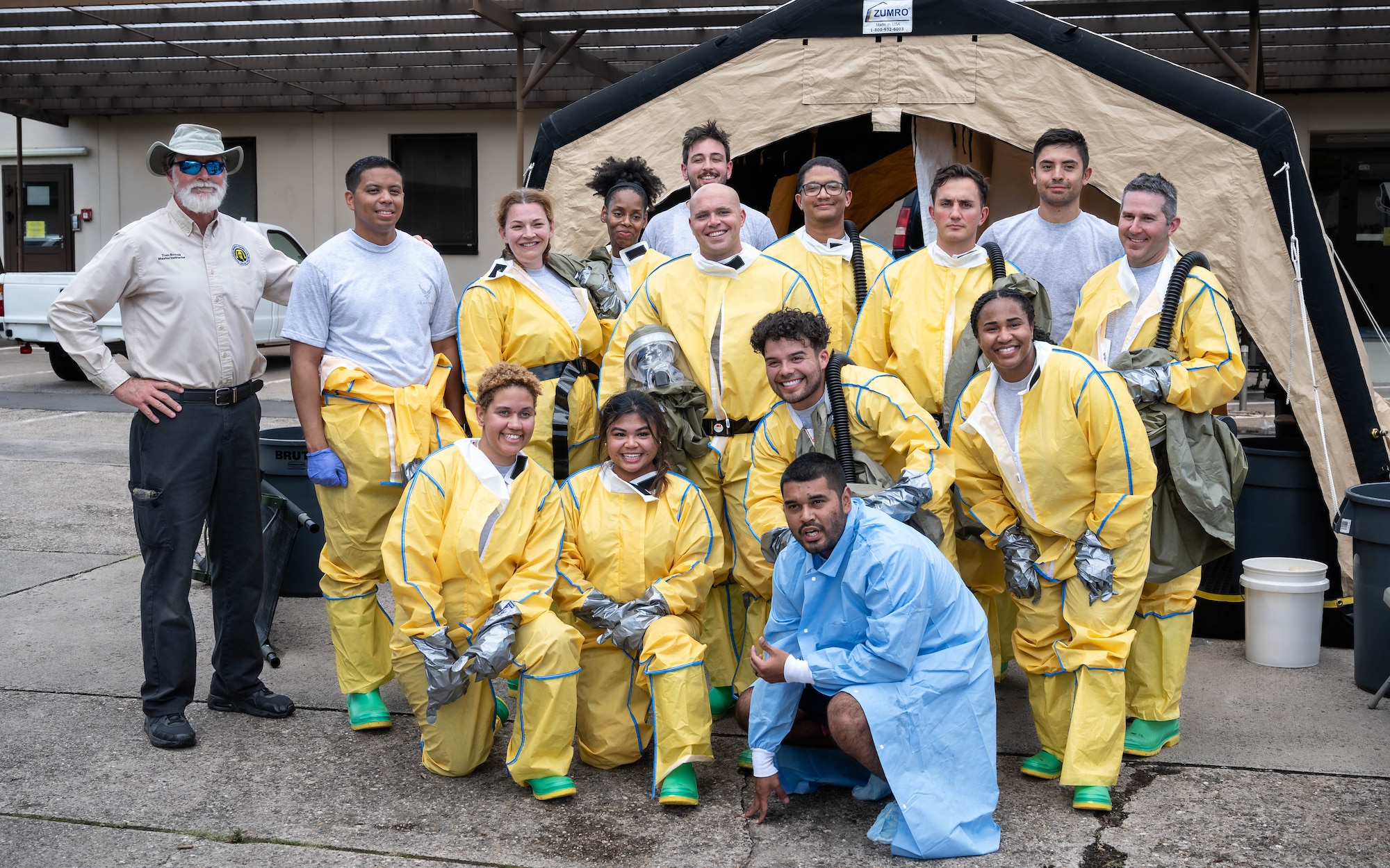 U.S. Air Force Airmen assigned to the 86th Dental Squadron, 86th Health Care Operational Squadron and the 86th Operational Medical Readiness Squadron, pose for a photo after successfully completing the 86th Medical Group’s in-place patient decontamination training capstone at Ramstein Air Base, Germany, Aug. 8, 2024. The objective of the Airmen in the capstone was to save a simulated patient and keep the medical facility operational by keeping the contamination outside. (U.S. Air Force photo by Senior Airman Jared Lovett)