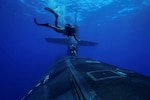 MEDITERRANEAN SEA (July 31, 2024) U.S. Marines from the 2nd Force Reconnaissance Company, assigned to Task Force 61/2, conduct dive operations with Ohio-class guided-missile submarine USS Georgia (SSGN 729) while underway in the Mediterranean Sea July 31, 2024. Headquartered in Naples, Italy, U.S. Naval Forces Europe-Africa (NAVEUR-NAVAF) operates U.S. naval forces in the U.S. European Command and U.S. Africa Command areas of responsibility. U.S. Sixth Fleet is permanently assigned to NAVEUR-NAVAF, and employs maritime forces through the full spectrum of joint and naval operations. (U.S. Navy Courtesy Photo)