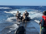 MEDITERRANEAN SEA (July 17, 2024) U.S. Marines from the 2nd Force Reconnaissance Company, assigned to Task Force 61/2, conduct launch and recovery operations from the deck of Ohio-class guided-missile submarine USS Georgia (SSGN 729) while underway in the Mediterranean Sea July 17, 2024. Headquartered in Naples, Italy, U.S. Naval Forces Europe-Africa (NAVEUR-NAVAF) operates U.S. naval forces in the U.S. European Command and U.S. Africa Command areas of responsibility. U.S. Sixth Fleet is permanently assigned to NAVEUR-NAVAF, and employs maritime forces through the full spectrum of joint and naval operations. (U.S. Navy Courtesy Photo)