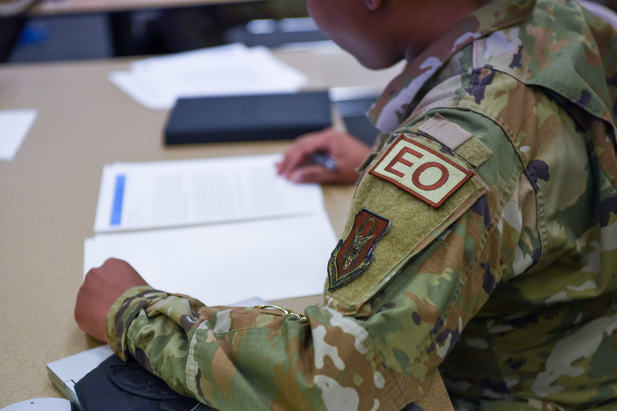 Woman reading a document.