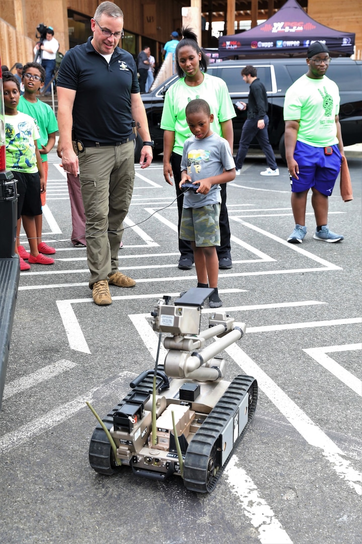 The District of Columbia National Guard Counterdrug Program participated in the Metropolitan Police Department's 41st annual National Night Out celebrations in Southeast Washington, D.C., August 6, 2024. The community-building campaign occurs the first Tuesday of August each year and is held by law enforcement agencies across the country.