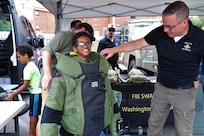 The District of Columbia National Guard Counterdrug Program participated in the Metropolitan Police Department's 41st annual National Night Out celebrations in Southeast Washington, D.C., August 6, 2024. The community-building campaign occurs the first Tuesday of August each year and is held by law enforcement agencies across the country. (U.S. Army National Guard photo by Ayan Sheikh)