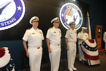 Vice Adm. Johnny R. Wolfe Jr., director of U.S. Navy Strategic Systems Programs (SSP) (right); Commanding Officer Capt. Michael Woehrman (middle); and incoming commanding officer Cmdr. Christopher Tilley (left) participate in a change of command for SSP’s Project Management Office for Flight Systems (SPF) Thursday. Cmdr. Tilley, the former Weapons Officer at Strategic Weapons Facility Pacific, took command from Capt. Woehrman during the ceremony, which marks longstanding tradition of passing leadership responsibilities in the Navy. SPF—one of SSP’s many field sites—provides the technical oversight and fleet support for the nation's sea-based strategic deterrent and equip the nation’s Warfighting Navy with safe, secure, reliable, and effective weapon systems (U.S. Navy Photo by Yeoman Submarine 2nd Class Alakai Merino/Released).