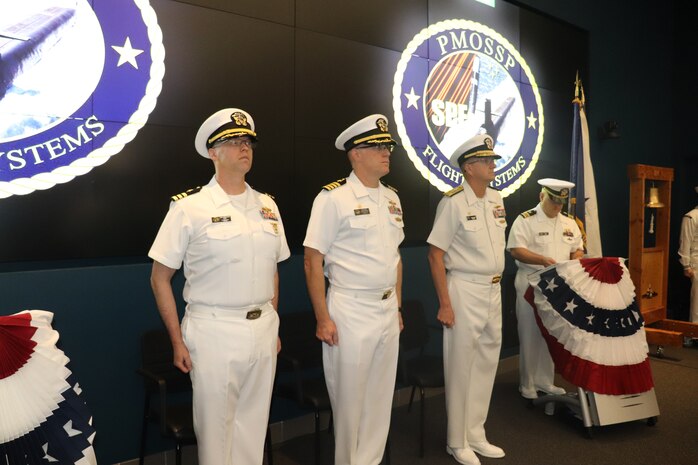Vice Adm. Johnny R. Wolfe Jr., director of U.S. Navy Strategic Systems Programs (SSP) (right); Commanding Officer Capt. Michael Woehrman (middle); and incoming commanding officer Cmdr. Christopher Tilley (left) participate in a change of command for SSP’s Project Management Office for Flight Systems (SPF) Thursday. Cmdr. Tilley, the former Weapons Officer at Strategic Weapons Facility Pacific, took command from Capt. Woehrman during the ceremony, which marks longstanding tradition of passing leadership responsibilities in the Navy. SPF—one of SSP’s many field sites—provides the technical oversight and fleet support for the nation's sea-based strategic deterrent and equip the nation’s Warfighting Navy with safe, secure, reliable, and effective weapon systems (U.S. Navy Photo by Yeoman Submarine 2nd Class Alakai Merino/Released).