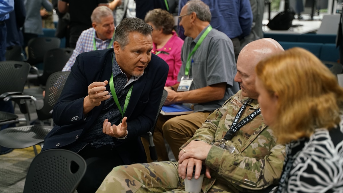 Challenge Showcase attendees discuss project capabilities during the I2A kick off event June 9 and 10, in El Segundo, CA. SpaceWERX recently announced the launch of its latest I2A cohort, focused on two specific topics: advancing Alternative Positioning, Navigation and Timing, or AltPNT solutions and pioneering the Digital Spaceport of the Future. These initiatives underscore SpaceWERX's commitment to accelerating technological innovations in aerospace operations. (Courtesy Photo)