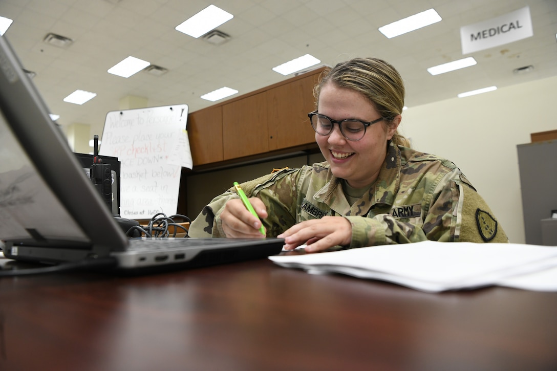 2nd Lt. Samantha Hambrick, a human resources officer with the 297th Regional Support Group, Alaska Army National Guard, manages the tactical personnel system at the Soldier Readiness Processing site as part of Mobilization Exercise (MOBEX) III at Camp Funston on Fort Riley, Kansas, Aug. 6, 2024.