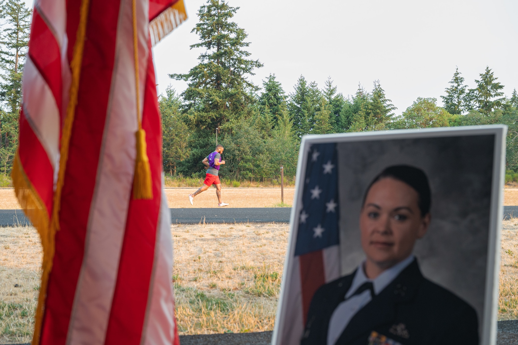 A Dash for Danielle Memorial Run participant jogs around the McChord track at Joint Base Lewis-McChord, Washington, Aug. 9, 2024.