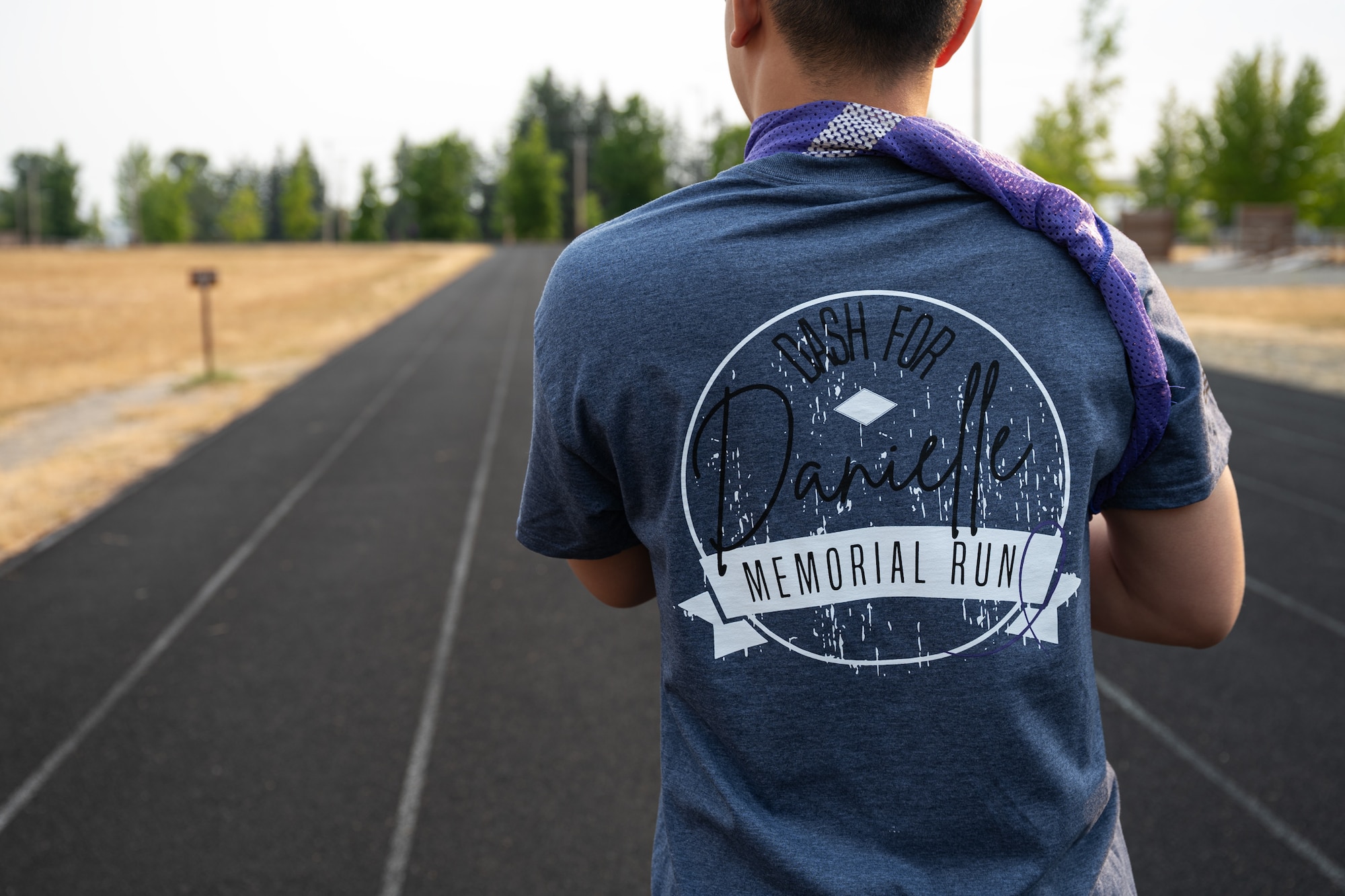 A U.S. Air Force Airman prepares to participate in the Dash for Danielle Memorial Run at Joint Base Lewis-McChord, Washington, Aug. 9, 2024.