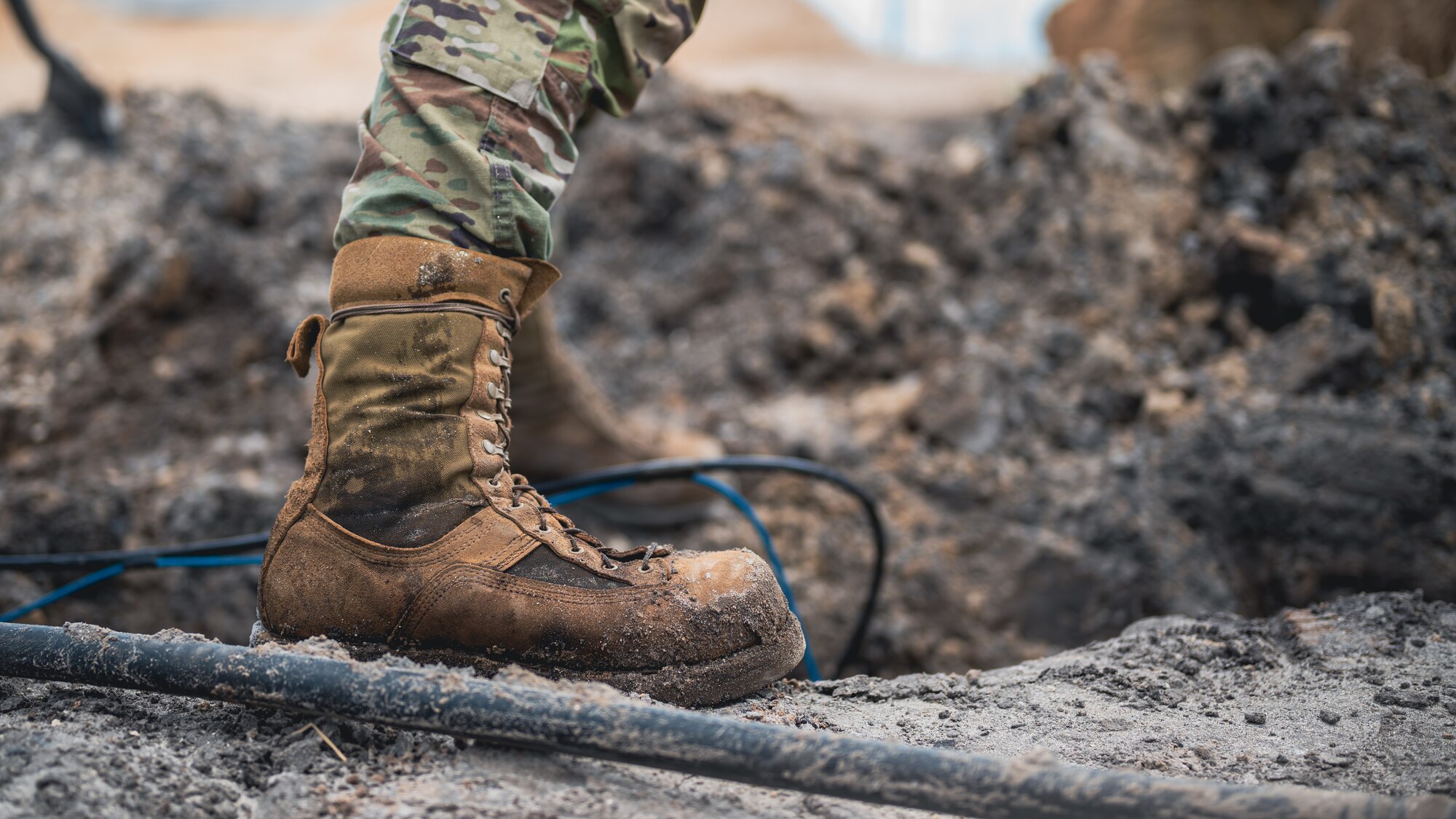 Air force boot on mud