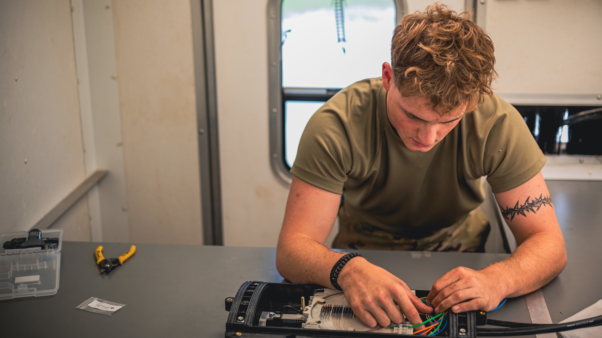 Airman analyzes cables