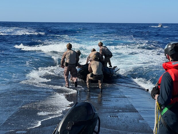 MEDITERRANEAN SEA (July 17, 2024) U.S. Marines from the 2nd Force Reconnaissance Company, assigned to Task Force 61/2, conduct launch and recovery operations from the deck of Ohio-class guided-missile submarine USS Georgia (SSGN 729) while underway in the Mediterranean Sea July 17, 2024. Headquartered in Naples, Italy, U.S. Naval Forces Europe-Africa (NAVEUR-NAVAF) operates U.S. naval forces in the U.S. European Command and U.S. Africa Command areas of responsibility. U.S. Sixth Fleet is permanently assigned to NAVEUR-NAVAF, and employs maritime forces through the full spectrum of joint and naval operations. (U.S. Navy Courtesy Photo)