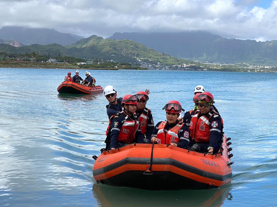 Combined forces from the U.S. Coast Guard Pacific Strike Team and Mexican Navy's Urban Search and Rescue Team practice urban search and rescue operations, simulating a flooded community after a hurricane as part of Exercise of Rim of the Pacific (RIMPAC) at Marine Corps Base Hawaii, July 12, 2024. The Defense Logistics Agency is behind the scenes supporting the USCG and other other services participating in RIMPAC with thousands of items including fuel so they can keep moving the mission. Twenty-nine nations, 40 surface ships, three submarines, 14 national land forces, more than 150 aircraft and 25,000 personnel are participating in RIMPAC in and around the Hawaiian Islands, June 27 to Aug. 1. The world’s largest international maritime exercise, RIMPAC provides a unique training opportunity while fostering and sustaining cooperative relationships among participants critical to ensuring the safety of sea lanes and security on the world’s oceans. RIMPAC 24 is the 29th exercise in the series that began in 1971. (Photo by Nutan Chada, Defense Logistics Agency) #RIMPAC2024