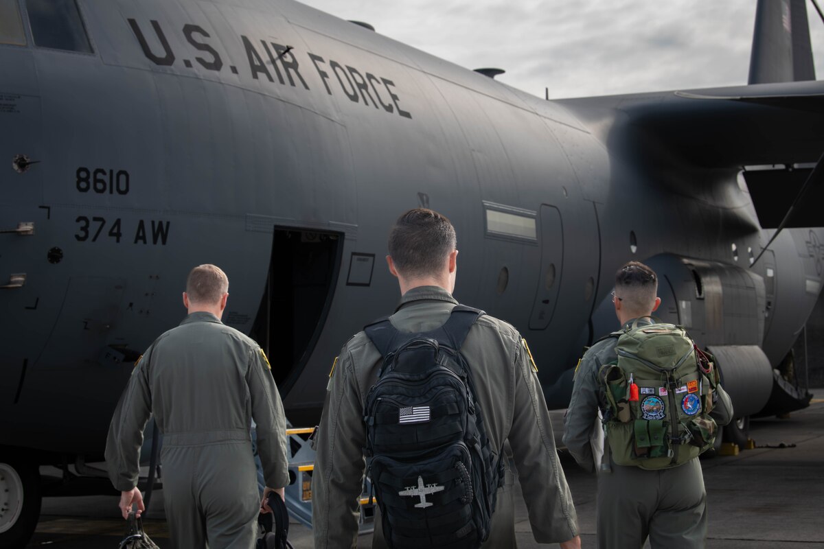 U.S. Air Force Airmen assigned to the 36th Airlift Squadron prepare to take off.