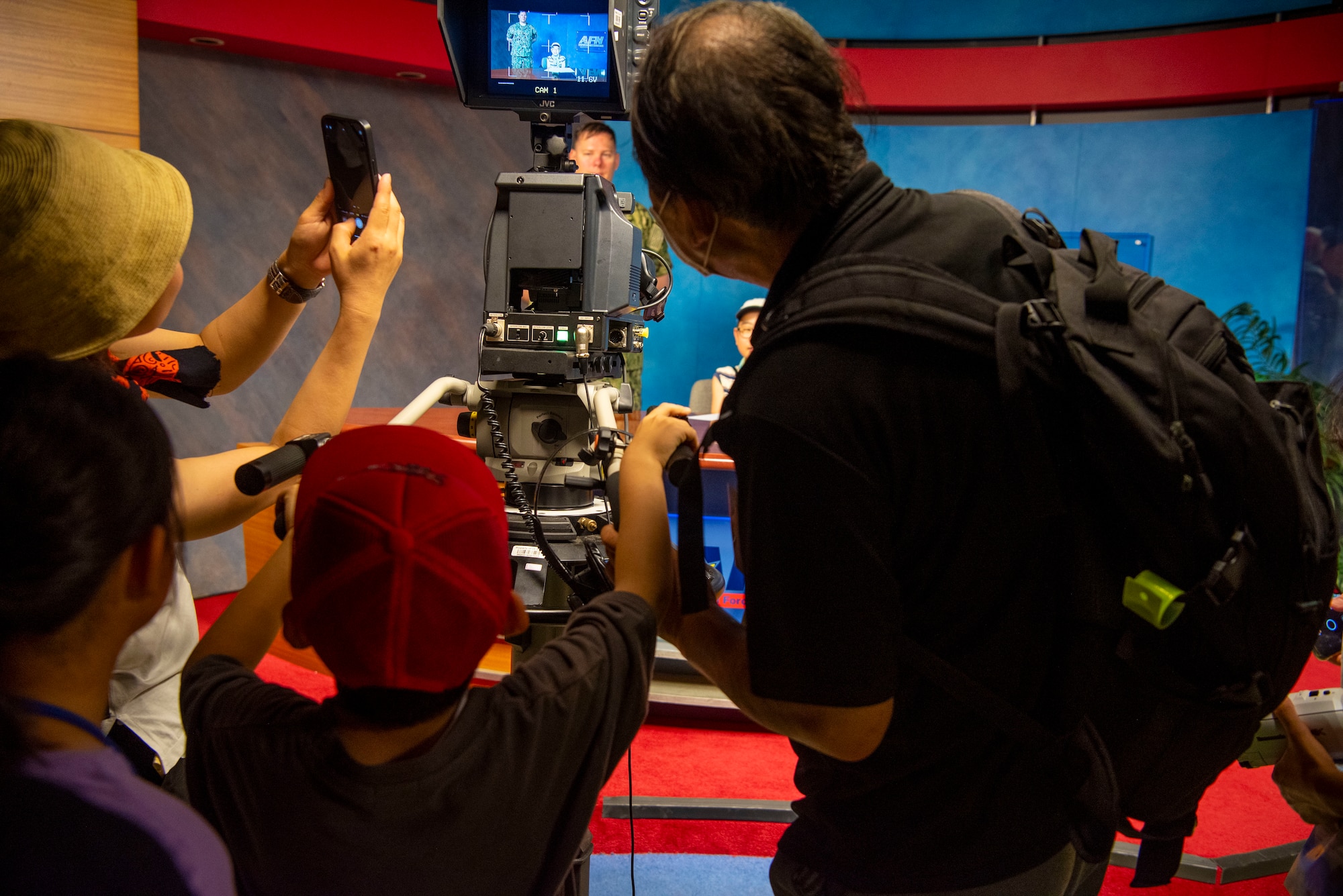 Misawa Friendship Tour participants learn about an American Forces Network camera at Misawa Air Base, Japan, Aug. 2, 2024.
