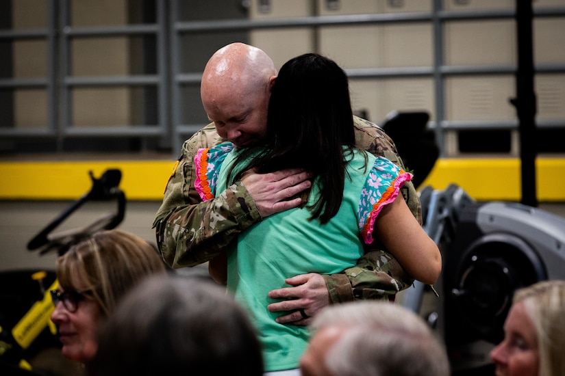 Soldiers with the 613th Engineer Facilities Detachment, 149th Maneuver Enhancement Brigade, say their farewells to their family and friends at the Springfield Army National Guard Armory in Springfield, Kentucky on August 5, 2024. Approximately 15 Soldiers of the 613 FACDET are departing for Kuwait for base directorate of public works mission at Camp Buehring. (U.S. Army National Guard photo by Andy Dickson)