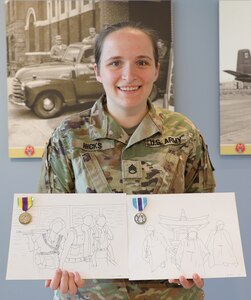 Staff Sgt. Lauren Hicks with her final sketches of the New York State Korean War Commemorative Medal, right, and the New York State Vietnam War Commemorative Medal.