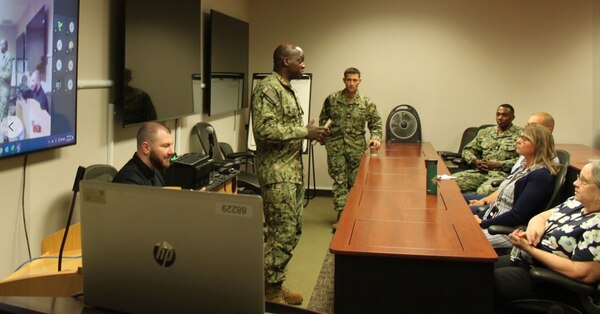 NMRLC executive officer, Cmdr. Olusegun Olabode, introduces himself as the newly reported second in command to NMRLC Detachment Fort Detrick personnel prior to the MSC birthday celebration.