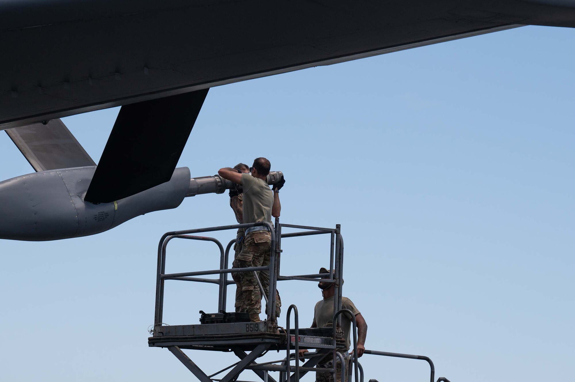 Citizen Airmen assigned to the 927th Maintenance Group, MacDill Air Force Base, Florida, prepare to change out the drogue on a KC-135 Stratotanker aircraft on Joint Base Pearl Harbor-Hickam, Hawaii, during Exercise Rim of the Pacific 2024, July 16, 2024. Twenty-nine nations, 40 surface ships, three submarines, 14 national land forces, more than 150 aircraft and 25,000 personnel are participating in RIMPAC in and around the Hawaiian Islands, June 27 to Aug. 1. The world's largest international maritime exercise, RIMPAC provides a unique training opportunity while fostering and sustaining cooperative relationships among participants critical to ensuring the safety of sea lanes and security on the world's oceans. RIMPAC 2024 is the 29th exercise in the series that began in 1971. (U.S. Air Force photo by Tech. Sgt. Bradley Tipton)