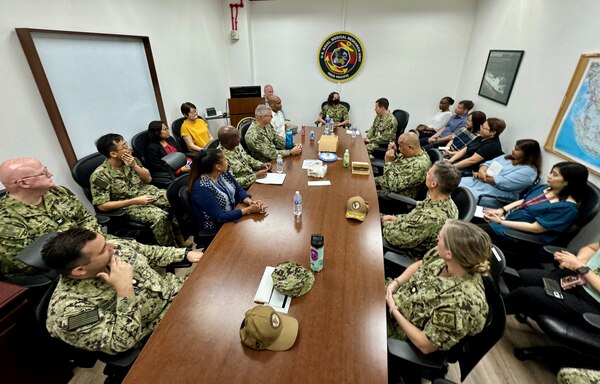 SINGAPORE (July 24, 2024) Capt. Franca Jones, commander, Naval Medical Research Command, visits with staff from Naval Medical Research Unit (NAMRU) INDO PACIFIC during an official site visit. NAMRU INDO PACIFIC, part of the Naval Medical Research & Development enterprise and headquartered out of Singapore, conducts research in cooperation with host nations in Vietnam, Laos, Singapore, Malaysia and Thailand to improve global health, ensure military force health protection and address infectious diseases such as malaria, dengue fever virus and gastro-intestinal pathogens. (U.S. Navy photo by Tommy Lamkin /Released)