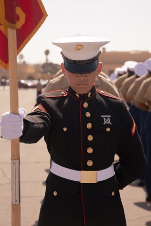 U.S. Marine Corps Pfc. Aiden Kelly, an honor graduate of Platoon 3262, Mike Company, 3rd Recruit Training Battalion, prays during the Mike Company graduation ceremony at Marine Corps Recruit Depot San Diego, California, Aug. 9, 2024. Graduation takes place at the completion of the 13- week transformation process, which includes training for drill, marksmanship, basic combat skills, and Marine Corps customs and traditions. (U.S. Marine Corps photo by Lance Cpl. Janell B. Alvarez)