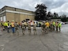 Alaska Army Guardsmen with Joint Task Force – Juneau meet with Department of Transportation personnel prior to assisting Juneau residents with recovery and cleanup efforts Aug. 10, 2024, following recent flooding after the Mendenhall Glacier’s Suicide Basin released.