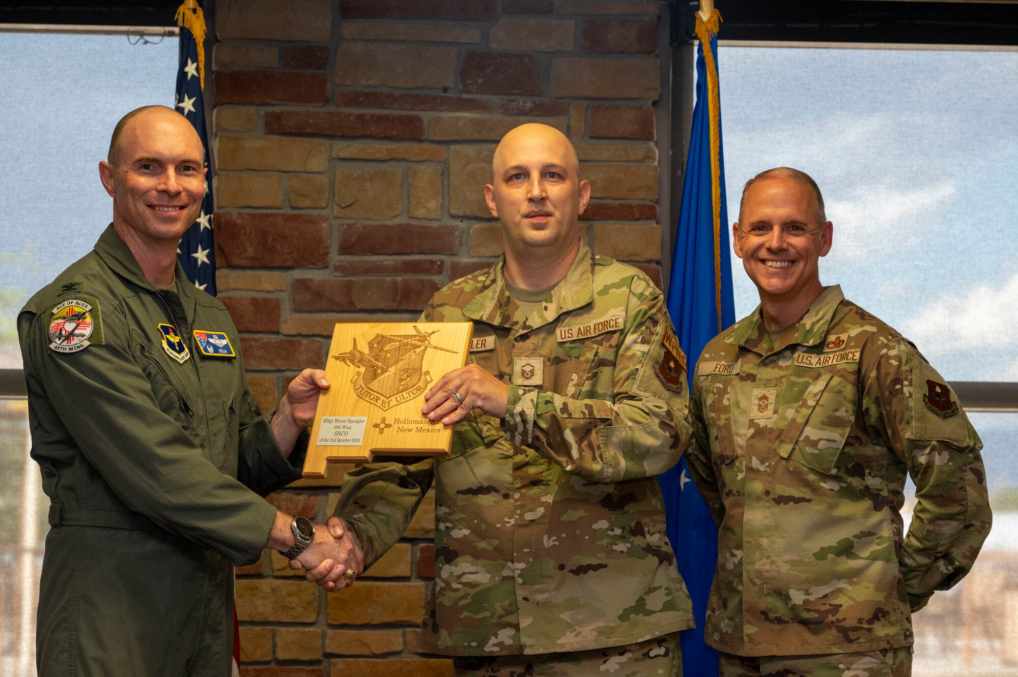 U.S. Air Force Master Sgt. Bryan Spangler from the 49th Maintenance Group, receives the Senior Non-commissioned Officer of the 2nd Quarter award during the 49th Wing’s 2nd Quarter Award ceremony at Holloman Air Force Base, New Mexico, Aug. 9, 2024. Quarterly award winners were selected based on their technical expertise, demonstration of leadership and job performance. (U.S. Air Force photo by Senior Airman Isaiah Pedrazzini)