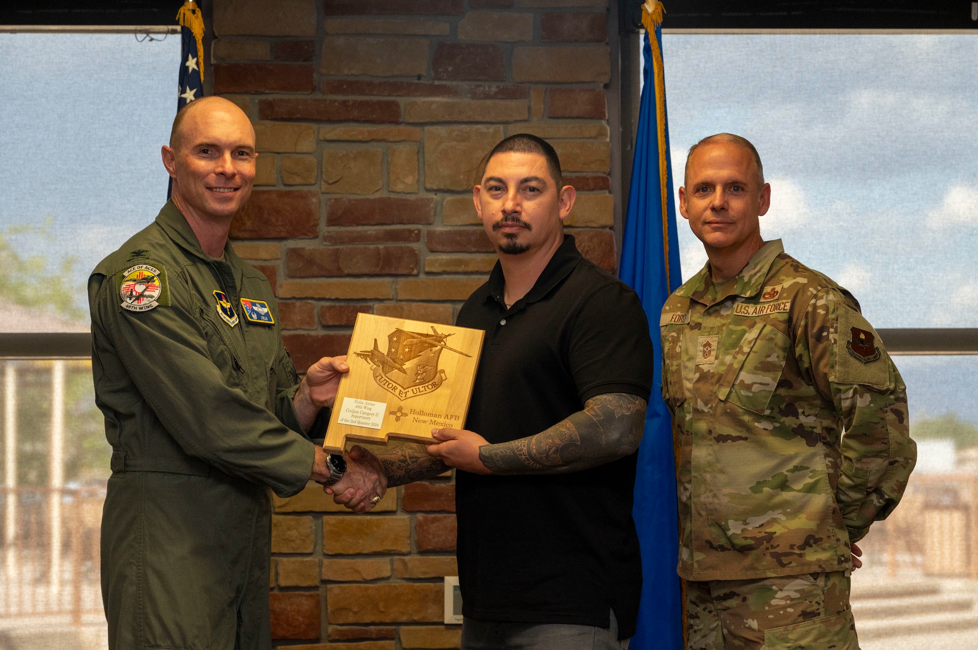 Felix Arias from the 49th Mission Support Group, receives the Civilian Category II Supervisory of the 2nd Quarter award during the 49th Wing’s 2nd Quarter Award ceremony at Holloman Air Force Base, New Mexico, Aug. 9, 2024. Quarterly award winners were selected based on their technical expertise, demonstration of leadership and job performance. (U.S. Air Force photo by Senior Airman Isaiah Pedrazzini)