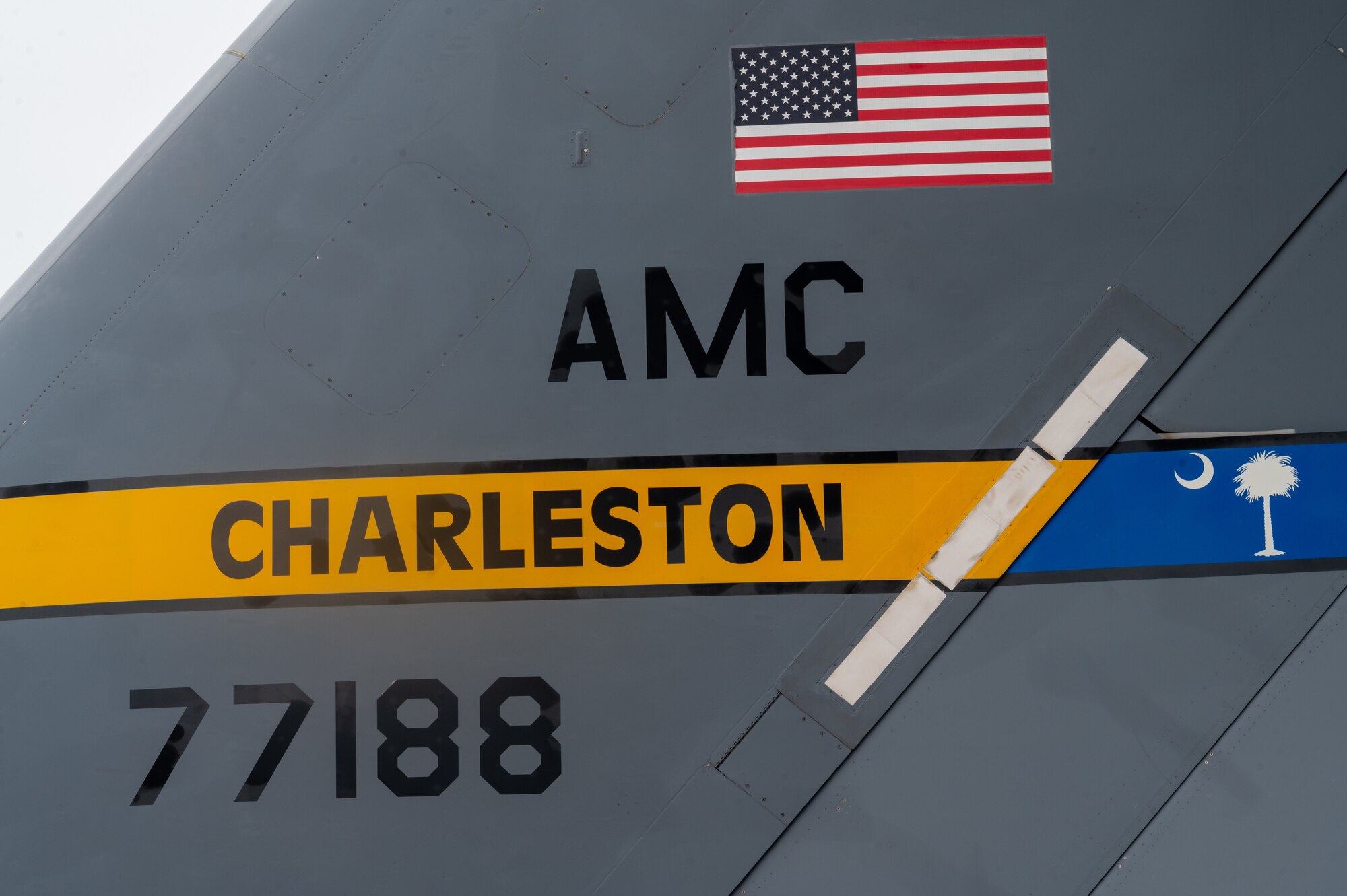 A U.S. Air Force C-17 Globemaster III from Joint Base Charleston, S.C., and another from Joint Base Lewis-McChord, Washington, are parked next to each other on the flightline, Aug. 8, 2024