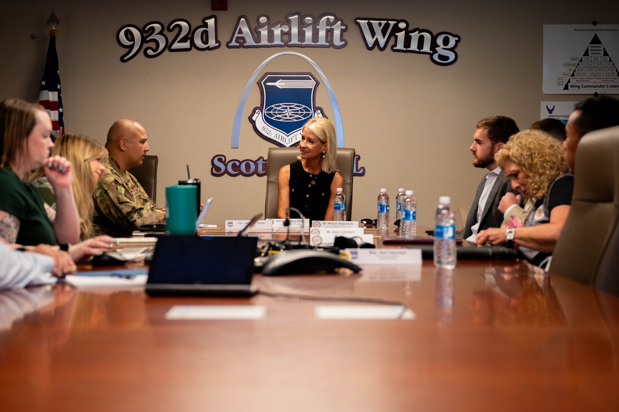 Congresswoman Mary Miller and her staff speak with 932nd Airlift Wing leadership on Aug. 12 at 932nd AW headquarters, Scott AFB, Illinois. During her visit, 932nd AW leadership provided a mission update brief to Miller and her staff and discussed Air Force Reserve key topics.