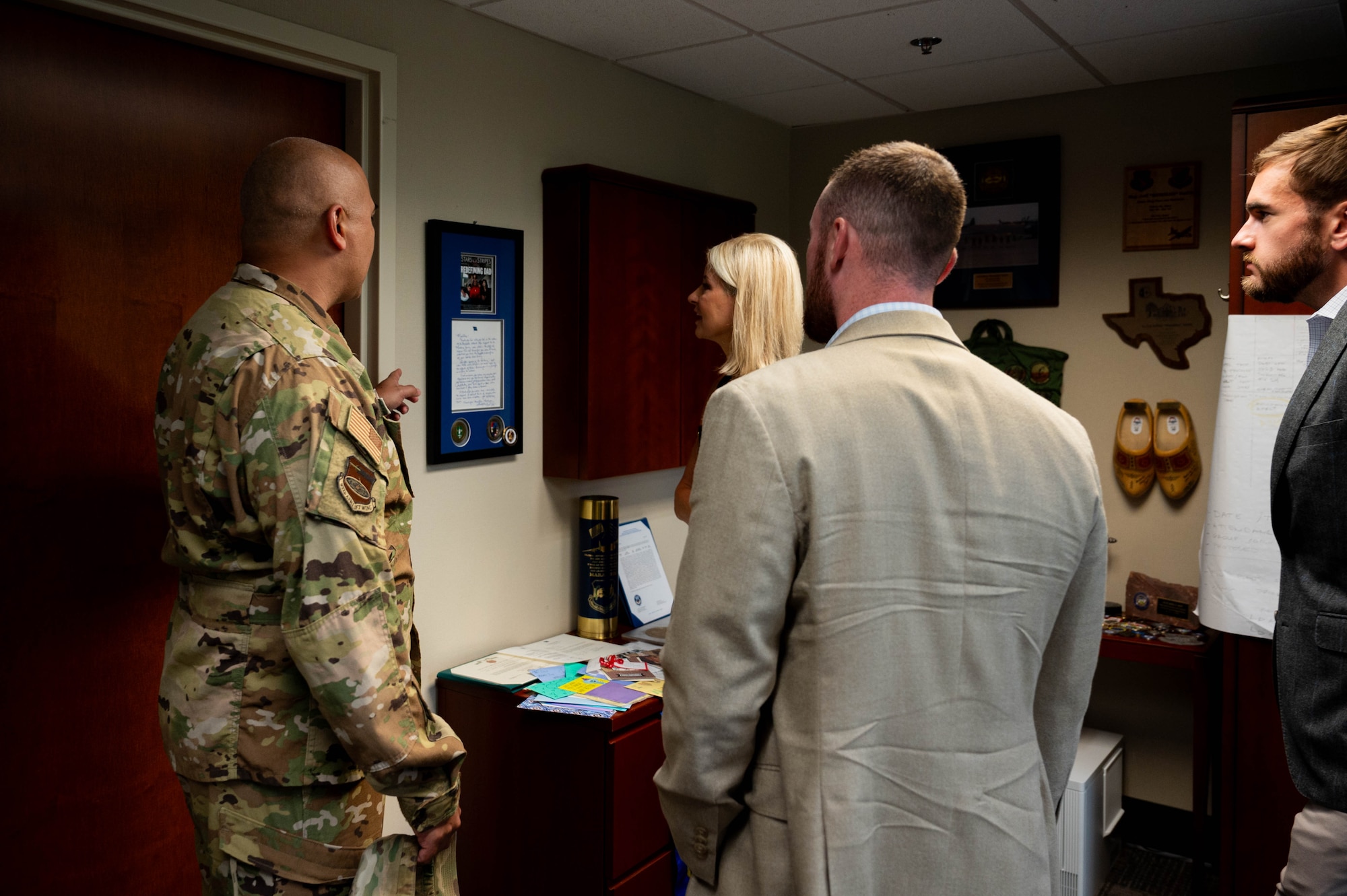 Col. Jeffrey Smith, 932nd Airlift Wing commander, talks to Congresswoman Mary Miller and her staff in Smith’s office on Aug. 12 at 932nd AW headquarters, Scott AFB, Illinois. During her visit, 932nd AW leadership provided a mission update brief to Miller and her staff and discussed important Air Force Reserve topics.