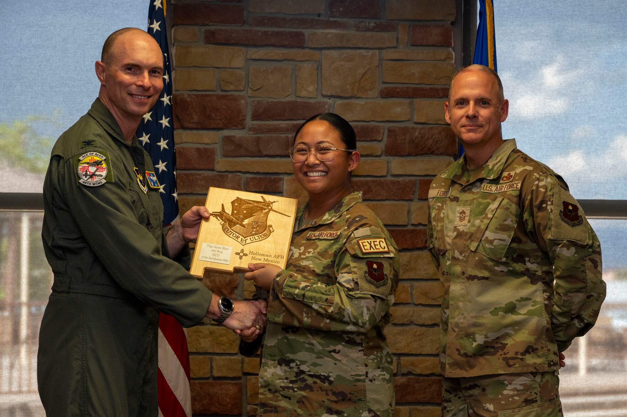 U.S. Air Force Tech. Sgt. Jayne Rhee from the 49th Mission Support Group, receives the Non-commissioned Officer of the 2nd Quarter award during the 49th Wing’s 2nd Quarter Award ceremony at Holloman Air Force Base, New Mexico, Aug. 9, 2024. Quarterly award winners were selected based on their technical expertise, demonstration of leadership and job performance. (U.S. Air Force photo by Senior Airman Isaiah Pedrazzini)