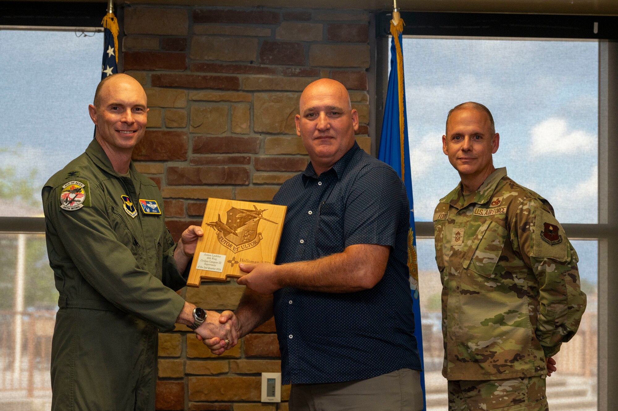 James Lashley from the 49th Maintenance Group, receives the Civilian Category III Supervisory of the 2nd Quarter award during the 49th Wing’s 2nd Quarter Award ceremony at Holloman Air Force Base, New Mexico, Aug. 9, 2024. Quarterly award winners were selected based on their technical expertise, demonstration of leadership and job performance. (U.S. Air Force photo by Senior Airman Isaiah Pedrazzini)