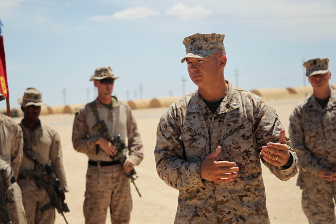 Servicemembers with 1st Battalion, 2d Marine Regiment, 2d MARDIV were awarded a Navy and Marine Corps Commendation Medal for rendering aid to a Marine during a live fire exercise, ultimately saving his life.