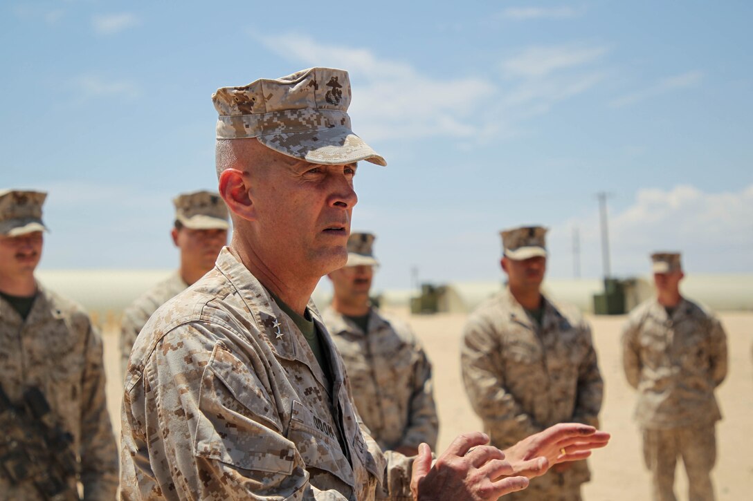 Servicemembers with 1st Battalion, 2d Marine Regiment, 2d MARDIV were awarded a Navy and Marine Corps Commendation Medal for rendering aid to a Marine during a live fire exercise, ultimately saving his life.