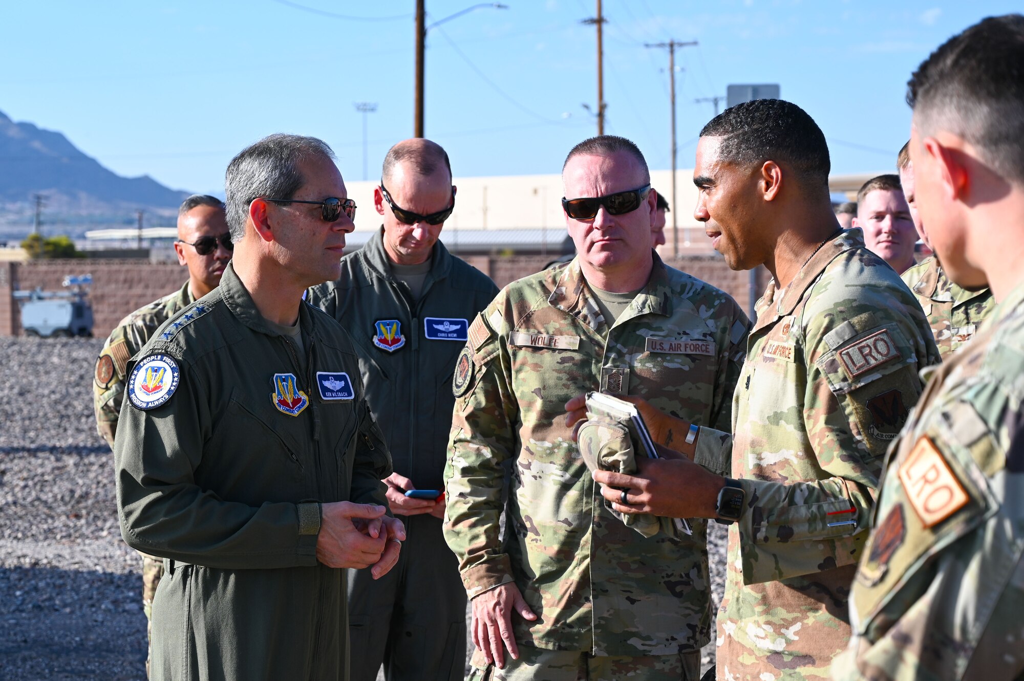 Air Combat Command leadership interacting with Airman from 99th Logistics Readiness Squadron