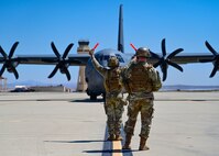 C-17 getting marshalled by an Airman