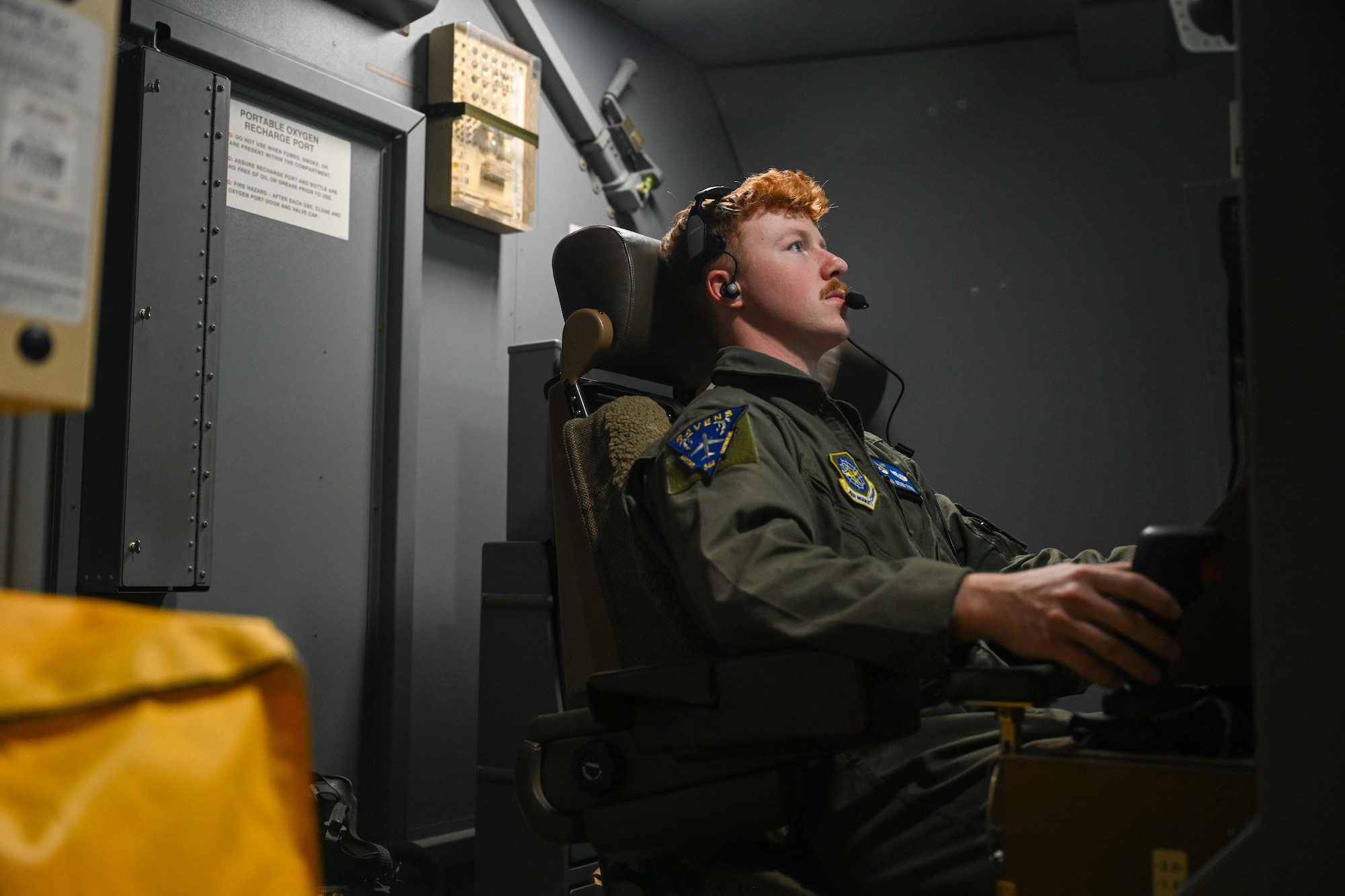 Senior Airman Orion Tyra, 344th Air Refueling Squadron boom operator, maneuvers a refueling boom aboard one of three KC-46 Pegasus tankers sent from McConnell Air Force Base, Kansas, to refuel combat and support aircraft during exercise Bamboo Eagle 24-3 on Aug. 8, 2024, over the coast of California. The 344th ARS provides critical inflight refueling capabilities with the Air Force’s newest tanker, testing its ability to deploy rapidly and maneuver the Joint Force at time, scale and mass. Bamboo Eagle is a coastal exercise that tests the integration of mobility, combat, bomber, joint and Allied aircraft, which is key to joint force and international partner success. This iteration’s BE 24-3 is an example of how the Air Force implements large-scale exercises and mission-focused training encompassing multiple operational plans to demonstrate and rehearse for complex, large-scale military operations. (U.S. Air Force photo by Senior Airman William Lunn)