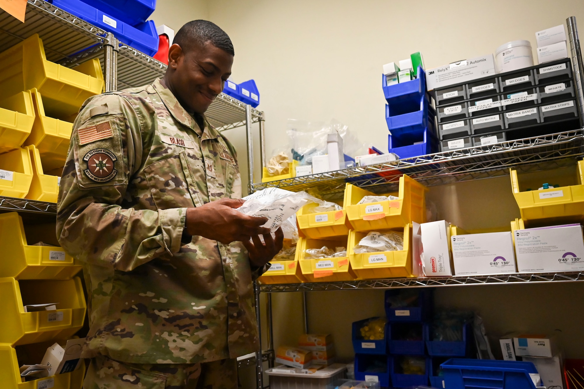 Tech. Sgt. Quentin Blash, 8th Operational Medical Readiness Squadron noncommissioned officer in charge of the dental clinic, organizes medical supplies at Kunsan Air Base, Republic of Korea.